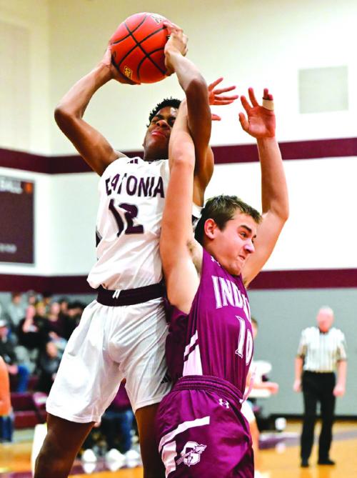 Flaronia’s Jaylon Anderson gets tangled up with a Ganado player Friday as he is shooting for two. Photo by Stephanie Steinhauser