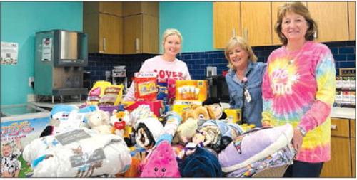 Presley’s Power made an Easter delivery to Dell Children’s hospital in Austin recently. Thanks to donations they were able to donate snacks, drinks, stuffed animals and blankets. Pictured is Marlana Wessels, Mary Frasher (with Dell children’s) and Jackie Wessels. Presley’s power is a local non-profit (401c3) committed to donating and helping children who are battling cancer.