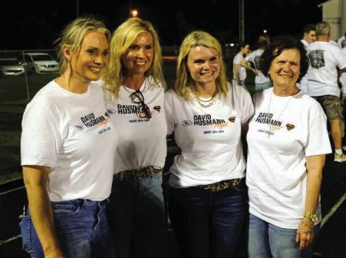 Schulenburg and Sacred Heart honored their former head coach, David Husmann, during the game Friday night. Pictured are (from left) his daughters Kristin Husmann Fisher, Angie Husmann Embry, Bonnie Husmann Seydler and widow Karen Husmann.