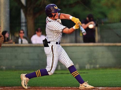 Senior Hunter Sabo, Leopard catcher, battles at the plate for La Grange in Monday’s game with Giddings. Sabo had three hits, including a pair of doubles Tuesday in the rematch. Photo by Stephanie Steinhauser