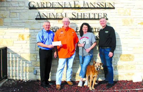 Colorado Valley Communications General Manager Kelly Allison, left, and Fayette Electric Cooperative General Manager/CEO Doug Lambert, right, proudly present a donation to Frank Reichert, Gardenia E. Jannsen Animal Shelter Board President, and Teresa Brown, Gardenia E. Jannsen Animal Shelter Executive Director, supporting the shelter’s mission to care for and protect animals in need.