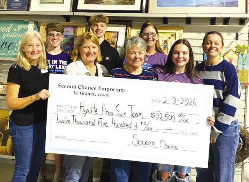 Second Chance Donates to Swim Team