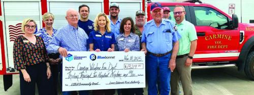 LCRA, Bluebonnet Donate to Carmine Fire Department to Help Buy Generator