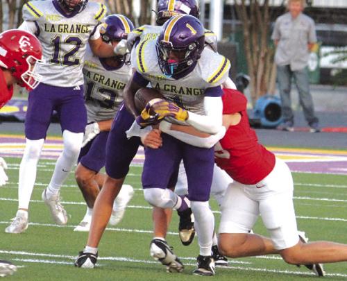 La Grange’s Trey Broussard runs back a kick-off in Friday’s game. Photo by Jeff Wick