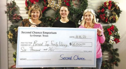 Second Chance Emporium (SCE) recently donated $6,000 to the Round Top Family Library. Monies donated will be used to purchase iPads for use by patrons, staff, teachers and volunteers. The Round Top Family Library provides traditional library services plus a variety of programs for all age groups. Pictured from left to right: Sheila Bain, Round Top Family Library Board Member; Julia Thomas, SCE Assistant Store Director and Gayle Schielack, SCE Store Director.