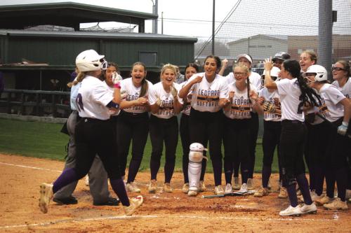 La Grange’s Madi Adams is greeted at home plate after she hit a two-run home run Tuesday. Photo by Jeff Wick