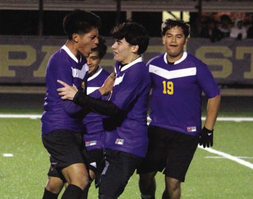 La Grange’s Aaron Torres, left, is mobbed by his teammates after scoring what would be the game-winning goal in Tuesday’s 1-0 district opening victory over Taylor. Photo by Jeff Wick