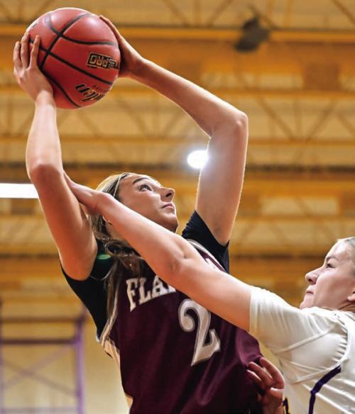 Summer Sodek puts up two points for The Flatonia Lady Bulldogs in Friday night’s win over The Weimar Lady Wildcats. Photo by Stephanie Steinhauser