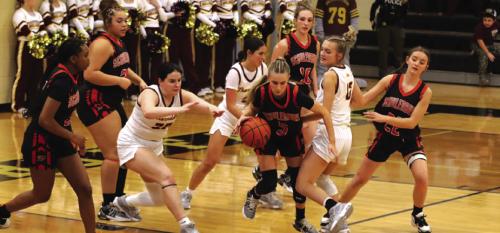 Schulenburg’s Jenna Guentert dribbles out of trouble in Tuesday’s playoff victory. Photo by Audrey Kristynik
