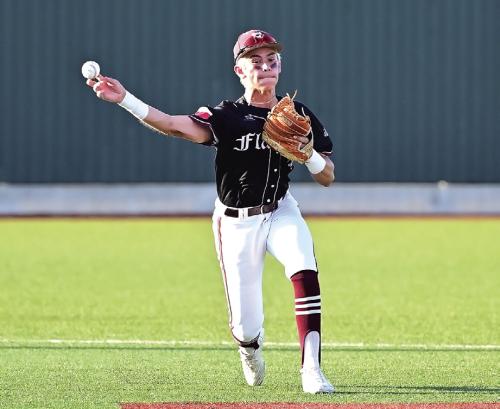 Cale Janecka throw to Neito at first base to get the out for the Flatonia Bulldogs in the win over the Kenedy Lions to move on to the next level of playoffs. Photo by Stephanie Steinhauser