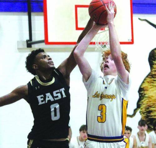 La Grange’s Hunter Gross takes a shot Friday against the defense of Victoria’s Braedyn Cates. Photo by Jeff Wick