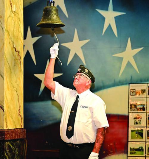 Joe Cockrell rings the bell during the Post Everlasting Ceremony at the The Flatonia American Legion Memorial Day service held on Sunday. The Post Everlasting Ceremony memorializes those killed in combat during World War I, World War II, The Korean War, The Vietnam War and conflicts thereafter. Flatonia once named all the names of fallen in each war from the area, but due to the length of that part of the service, they cut it down to those who have fallen in the last year. Photo by Stephanie Steinhauser