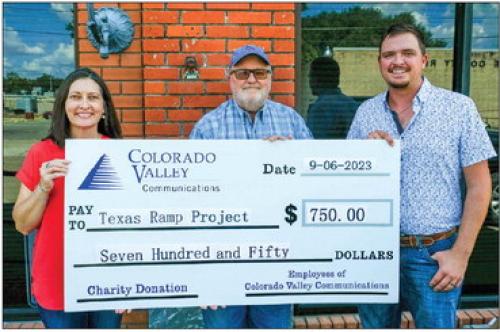 The employees of Colorado Valley Communications (CVC) presented a $750 donation to the Texas Ramp Project. The money comes from voluntary contributions by CVC employees. Pictured are (from left) CVC customer relations assistant Carol Osina, J. Frank Smith of the Texas Ramp Project and CVC field engineer Hunter Hengst. Photo by Andy Behlen