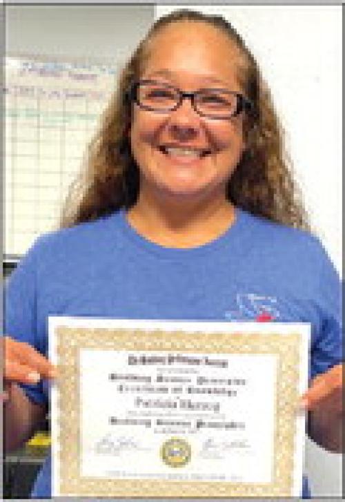 Herzog Earns Rare Certification