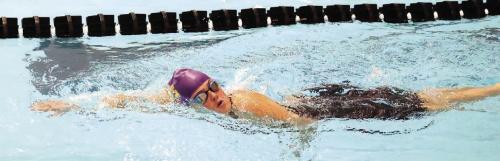 Laney Herdler broke her 500-yard freestyle record for the second time this season. She shaved an impressive 2.95 seconds off her previous time, establishing a new school record of 7:15.24. Photo by Katy Michalke