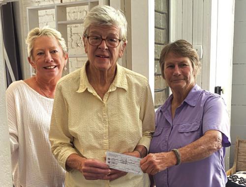 Lion’s Club donating $1,000 to Yvonne McGowen for the local museum. Pictured from left is: Jeanne Schilling, Yvonne Mc-Gowen and Jan Knippel.