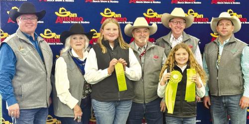 7th Place Team: Pictured with San Antonio Livestock Show and Rodeo Representatives, Center holding ribbon, Zoey Krenek and Catelyn Bosl. Not pictured is Abraham McBride and Abigale McBride.