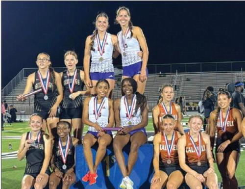 La Grange’s Diamond McKenzie, London Broussard, Kyndal Brawley and Macie Collier are atop the medal stand after winning the District 22-4A 4x400 relay Thursday.