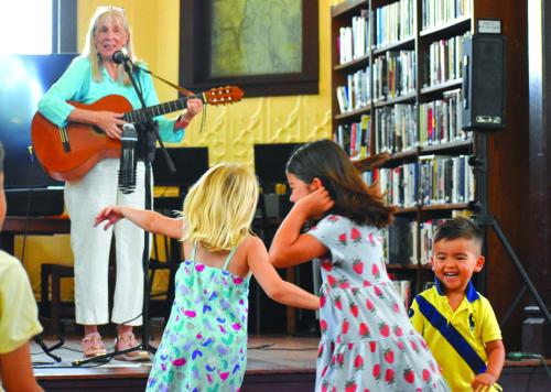 Big smiles and lots of fun during Sue Young’s performance at the Round Top Family Library last summer.