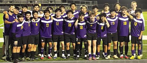 The members of the La Grange varsity boys soccer team pose on the field after Tuesday’s 6-0 season-opening victory over Luling. Photo by Jeff Wick