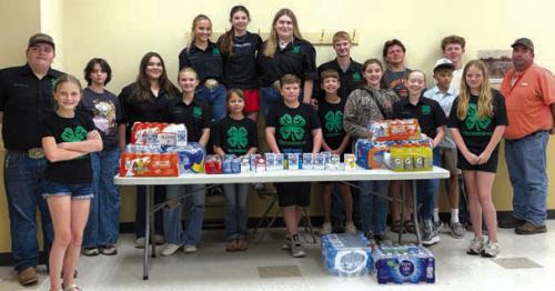 Brandon Karisch was on hand representing the Ellinger Volunteer Fire Department to accept a donation of water, Gatorade and other electrolyte drinks from the Pure Country 4H Club. The club donated these items at the recent meeting on Sunday, May 17.
