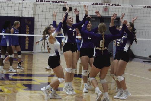 The members of the La Grange volleyball team celebrate a point during Tuesday’s victory over Navasota. Photo by Jeff Wick