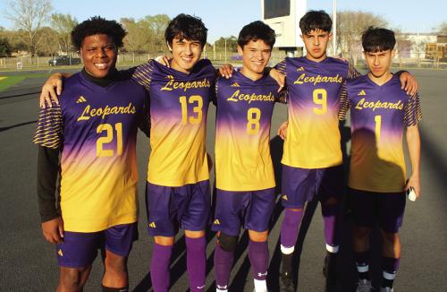 The seniors on the La Grange boys soccer team gathered for this group photo before their final game of the season Monday at home. Left to right: Jaylances Johnson, Saige Walter, Orlando Solorzano, Xavier Ortiz, Anthony Soto. Not pictured was one more senior player, Alejandro Ramirez, who was in New York with the Leopard Band playing at Carnegie Hall. Photo by Jeff Wick