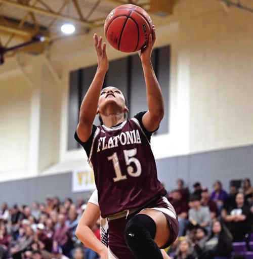 Kalen Scott scores for the Flatonia girls in Friday’s 76-46 win over Weimar. Photo by Stephanie Steinhauser