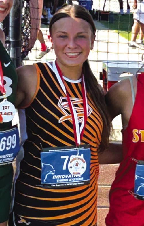 Schulenburg’s Ellie Hammack on medal stand in El Campo.