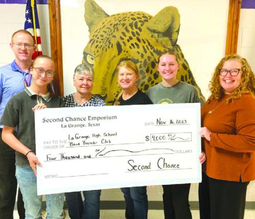 Second Chance Donates to Band Booster Club, RT Family Library