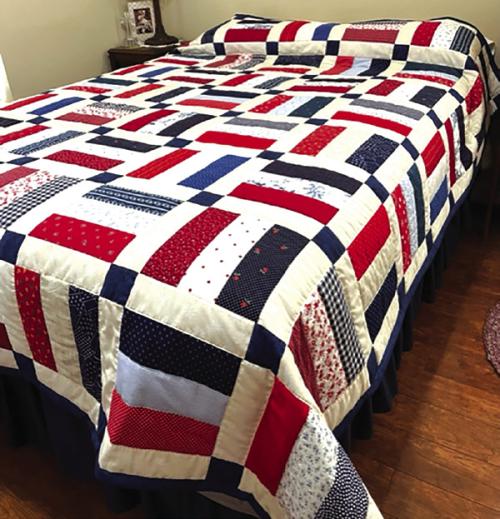 The hand quilted quilt for live auction at St. John.