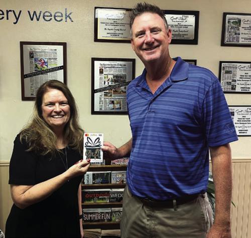 For the second time in three weeks David Cooper was the winner of The Fayette County Record’s reader football pick-it contest by correctly picking the winner of all 10 games last week. He is shown here accepting his $100 gift card from Record publisher Regina Keilers. The ballot appears in every Tuesday edition of The Record. Photo by Jeff Wick