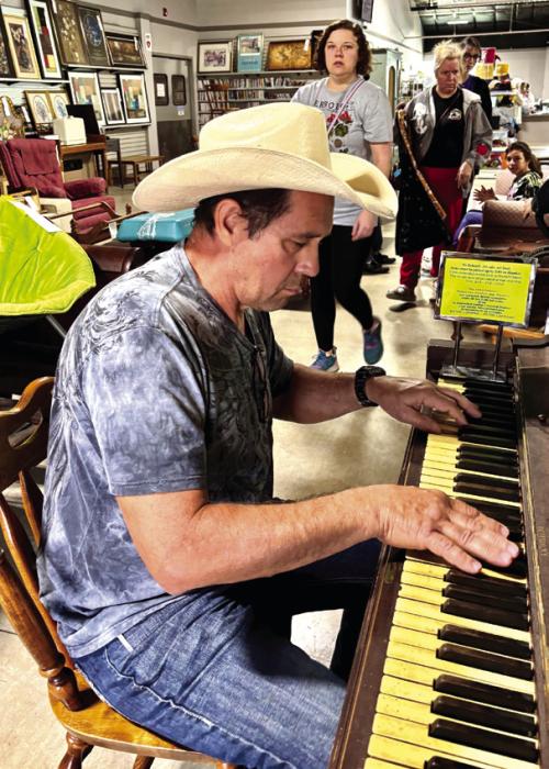 Kevin Wymer took a turn at the keyboard, engrossed in his own jazz compositions. Wymer, of Giddings, had helped purchase another piano earlier in the week for an assisted-living facility where he plays on occasion. He decided to pass on the 1948 Kurtzmann at Second Chance.