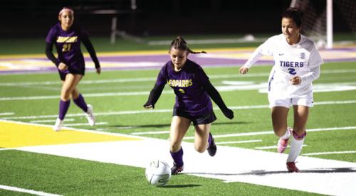 La Grange’s Miriam Lopez and Eliza Luna in action Friday. Photo by Katy Michalke