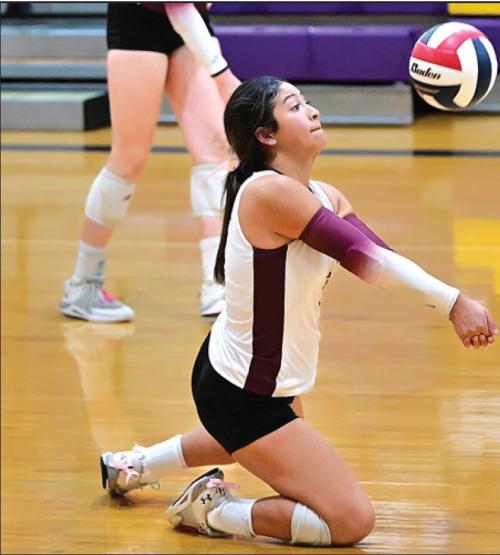 Senior Lady Bulldog Elzah Herrera digs up a ball in Set 3 in Tuesday night’s win over The Weimar Lady Cats. Photo by Stephanie Steinhäuser