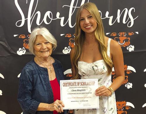 Pictured is Fayette County Czech Heritage Society President, Betty Danner, with scholarship recipient Clara Magliolo.