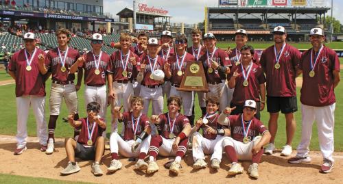 The members of the Fayetteville baseball team pose with their state championship medals and the state title trophy after winning Saturday’s 1A championship game 4-2 over Gordon. Photo by Jeff Wick