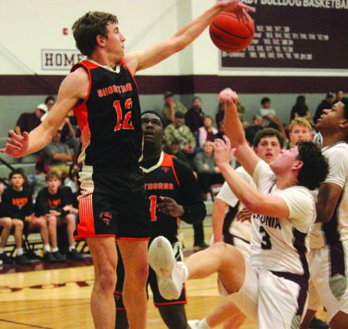 Schulenburg’s Van Prihoda blocks a Flatonia shot in Friday’s game. Photo by Jeff Wick