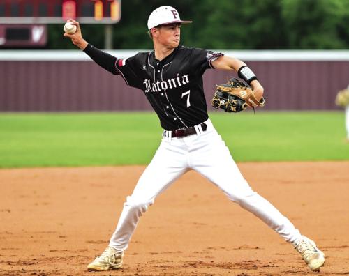 Freshman third baseman Kullen Kutac make the throw over to first for an out last week. Photo by Stephanie Steinhauser