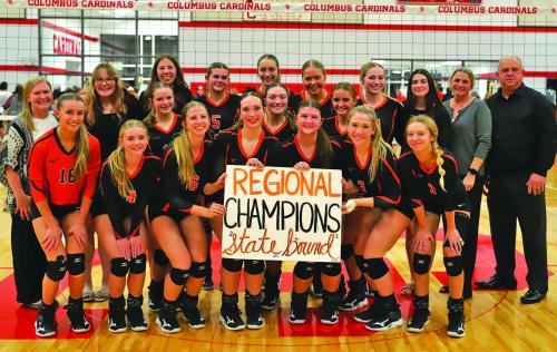 The members of the Schulenburg volleyball team celebrate after Tuesday’s regional final win over Flatonia in Columbus. Photo by Audrey Kristynik