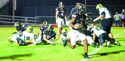 Schulenburg’s Da’Terrion Houston crosses the goal line through a wide open hole Friday. Photo by Andy Behlen