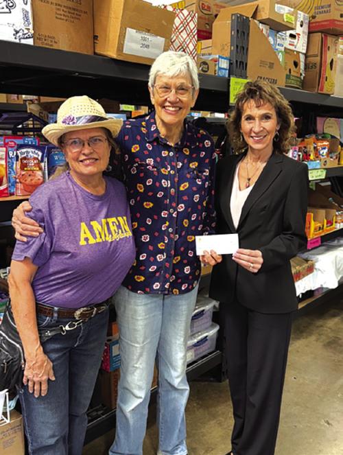 Hostyn KJT Donates to AMEN Food Pantry