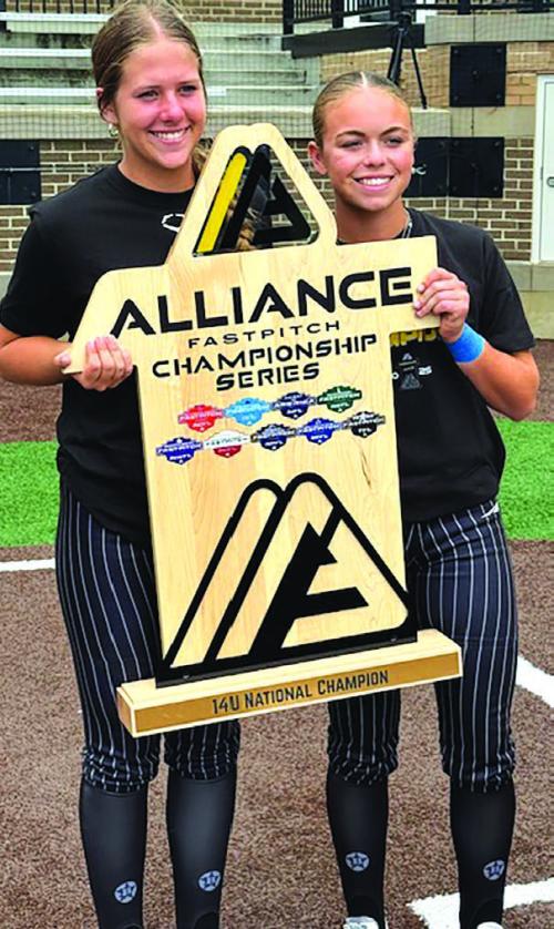 Here is a picture of La Grange’s Brooke Ulrich, left, and Giddings’ Landry Mutscher, right, after they helped the Texas Bombers win the Alliance Fast Pitch National Championship in Indiana July 31.