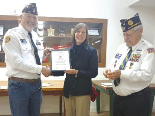 Lori receives the American Legion Gold Medal in recognition of faithful and honorable Service in the United States Army Nurse Corps. Presenting the award are Richard Gray (Post Commander) and Glenn Altwein (Past Post Commander).