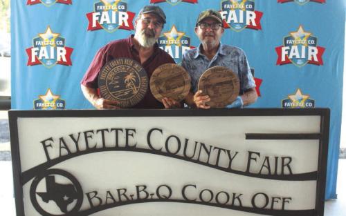 Overall Reserve Champions – The “Navaque” team of, left to right, James Nava of Bastrop and his father James Nava Sr.