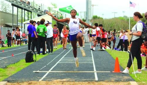 La Grange’s Jace Baptiste leaps for the pit in the varsity girls long jump Thursday. She was eighth with a leap of 15-2.25. We’ll have full results in Tuesday’s Record. Photo by Jeff Wick