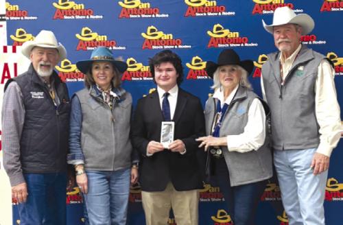 Senior Public Speaking: Logan Poncik, center with SALE Representatives.