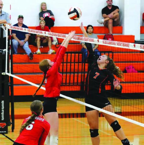 Schulenburg’s Landry Zapalac, right, battles at the net in Tuesday’s victory over Columbus. Photo by Audrey Kristynik