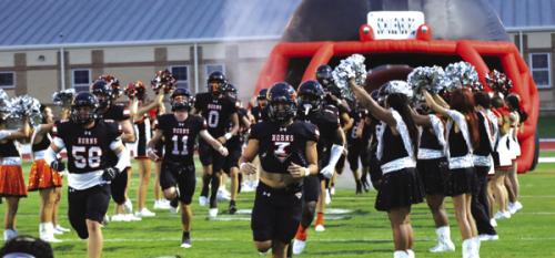 The Shorthorn run onto the field prior to Friday’s game. Photo by Audrey Kristynik