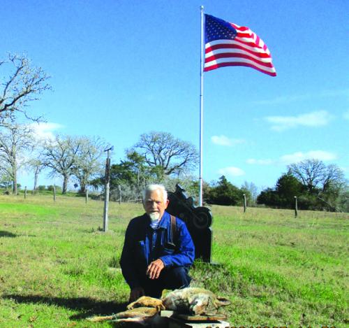 John D. Marburger poses with coyote No. 151 he snared on his farm near Warda on January 3, 2025. He snared coyotes Nos. 149 and 150 on Christmas eve 2024. To date, John D. has snared 151 coyotes and 60 feral pigs. He says his goal for 2025 remains the same: reduce attendance at the Warda chapters of the feral pig and coyote family reunions.